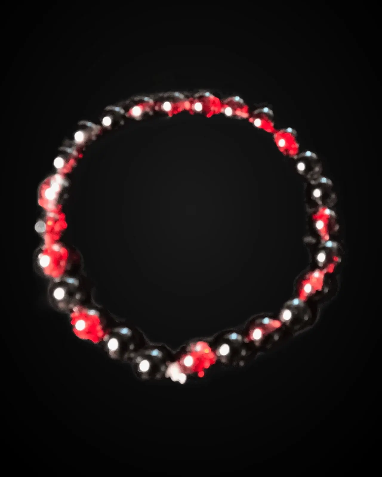 Ember Night — Black rounds & ruby glass